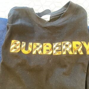 Authentic like new Burberry Black Tee with Vibrant Logo size medium.